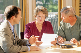 Discussion between two men and woman about services that Always Best Care offers